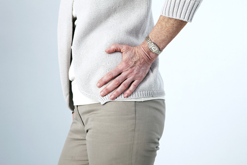 Senior lady with hand on hip