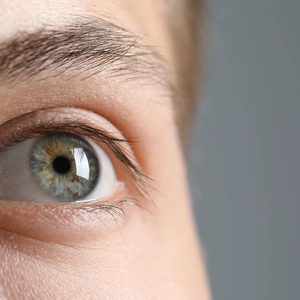 A macro image of a male's eye 